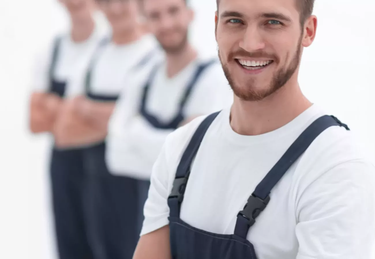 Group of professional industrial workers. Isolated over white background.